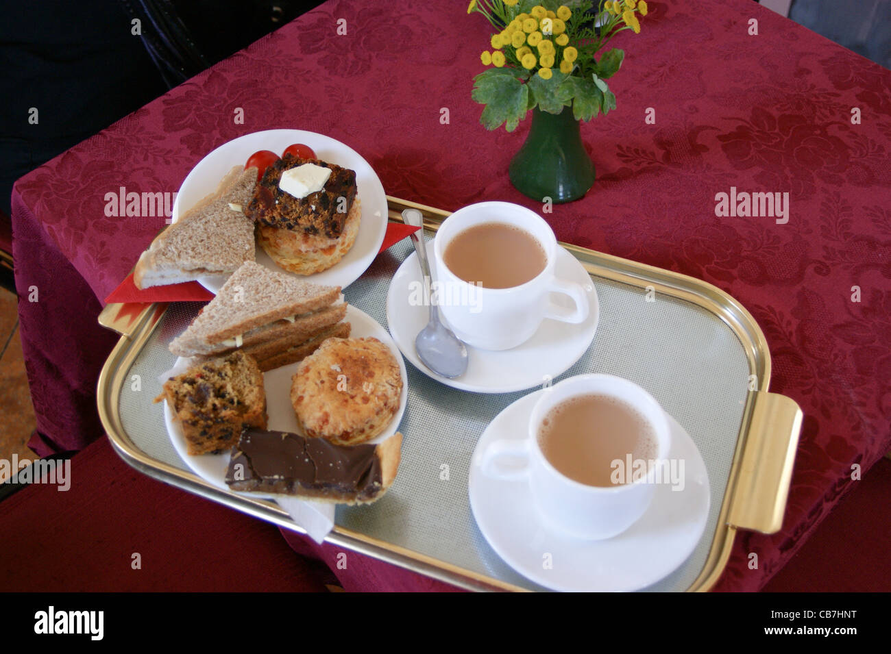 Tea, cake and sandwiches, afternoon tea at the village fair, Romaldkirk, County Durham, England Stock Photo
