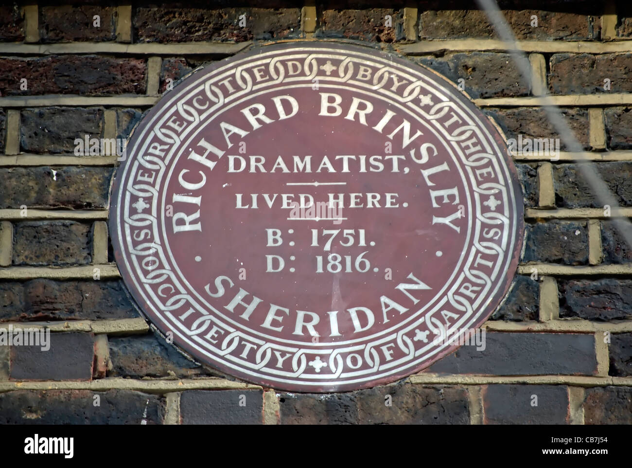 plaque marking a home of dramatist richard brinsley sheridan, savile row, london, england Stock Photo