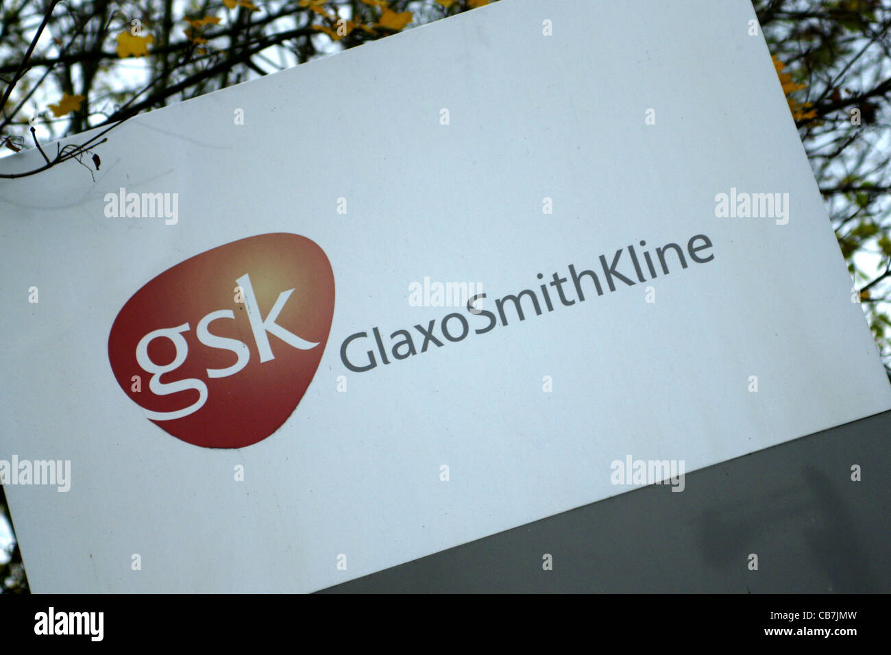 Company logos and signs at the GSK Glaxo factory in Ware, England Stock Photo