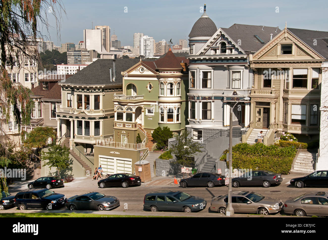 San Francisco City the Alamo Square neighborhood and park Victorian architecture 1870 - 1920 downtown skyline California USA Stock Photo