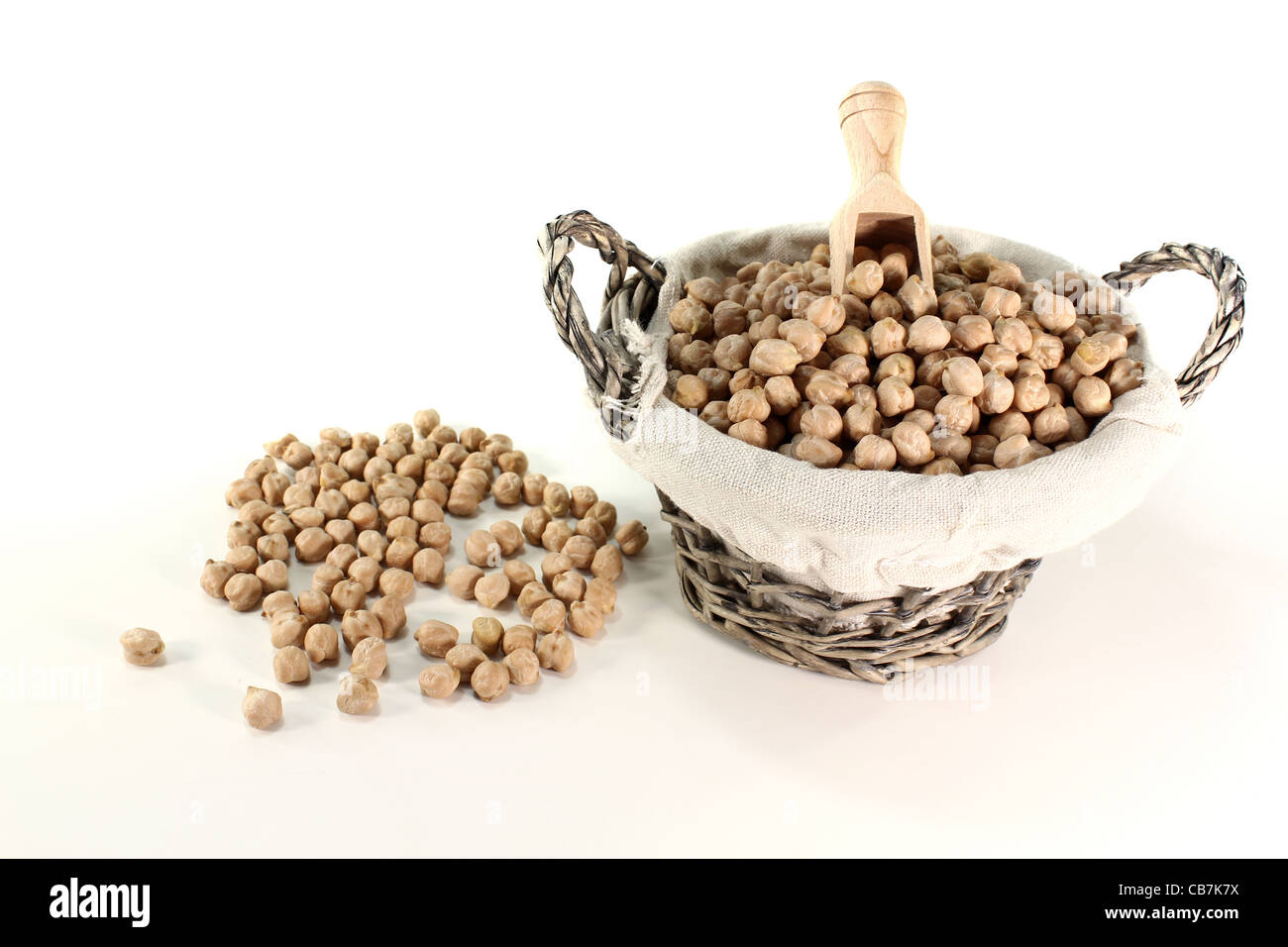 yellow dried chick peas in a basket with bushel Stock Photo