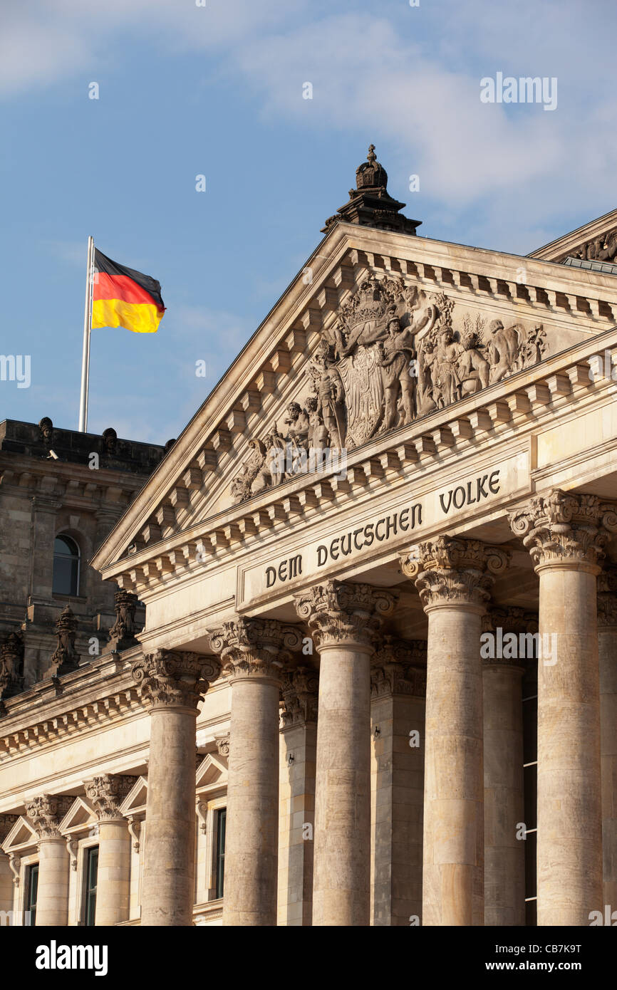 The Reichstag and German flag, Berlin. Stock Photo