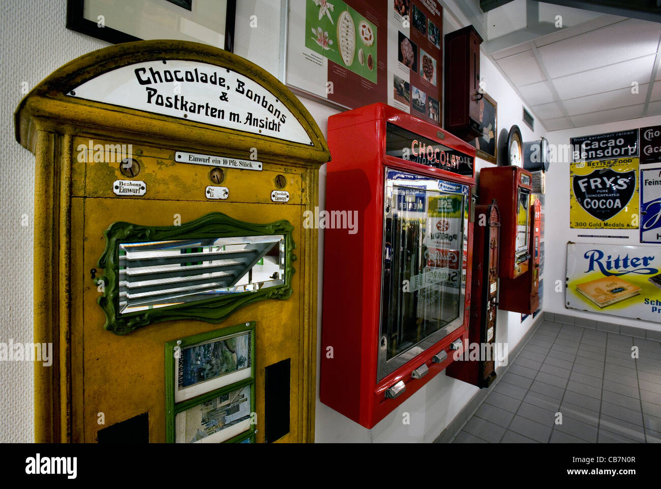 Interior of the Jacques Chocolate Museum showing old confectionery dispensers, venders and slot machines, Eupen, Belgium Stock Photo