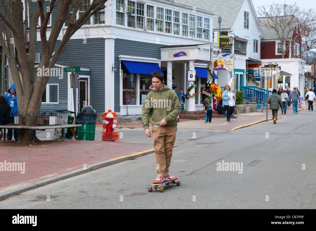 Teenager on skateboard in Provincetown, Cape Cod Stock Photo