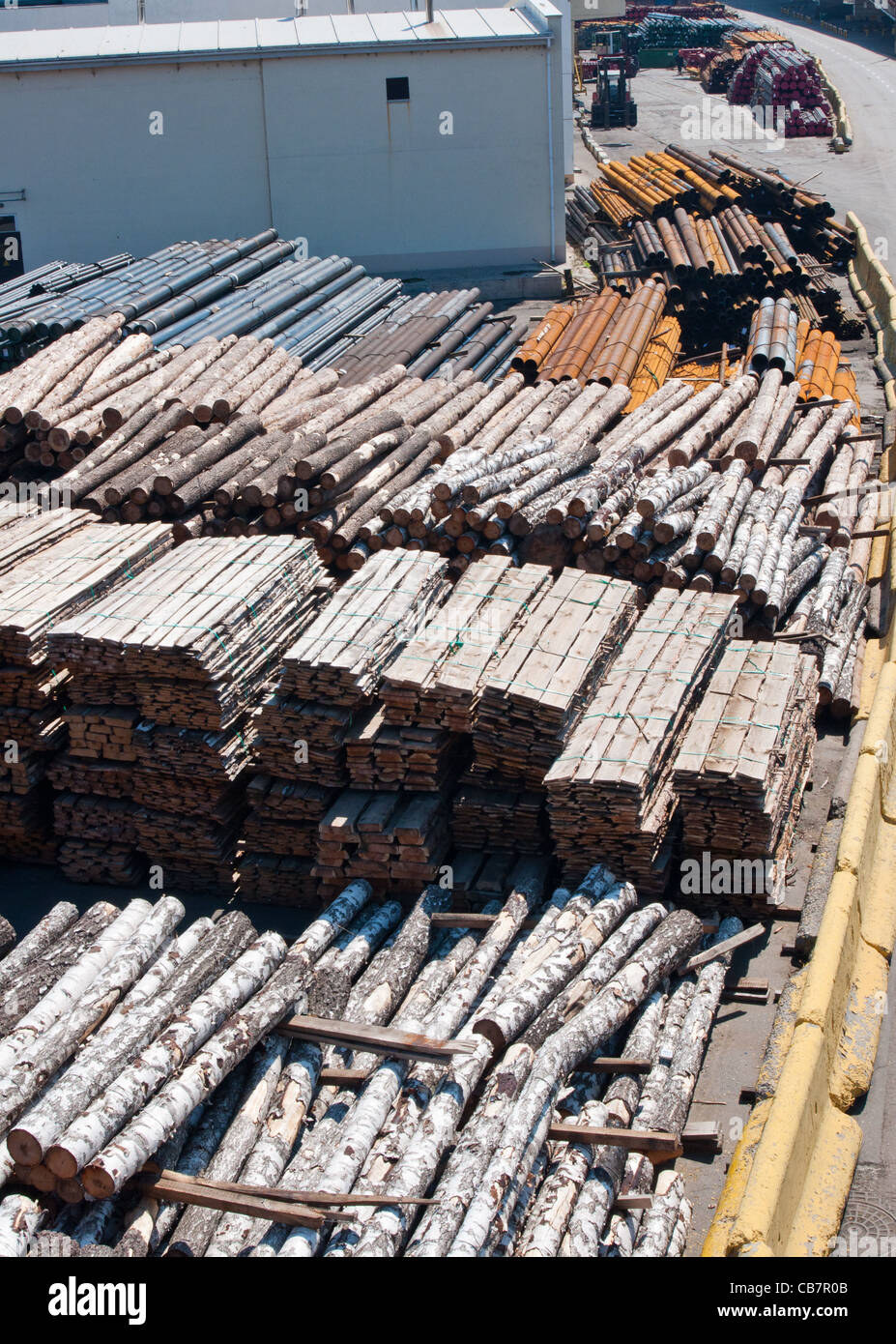 Timber and other raw materials on the dockside at Odessa, Ukraine Stock