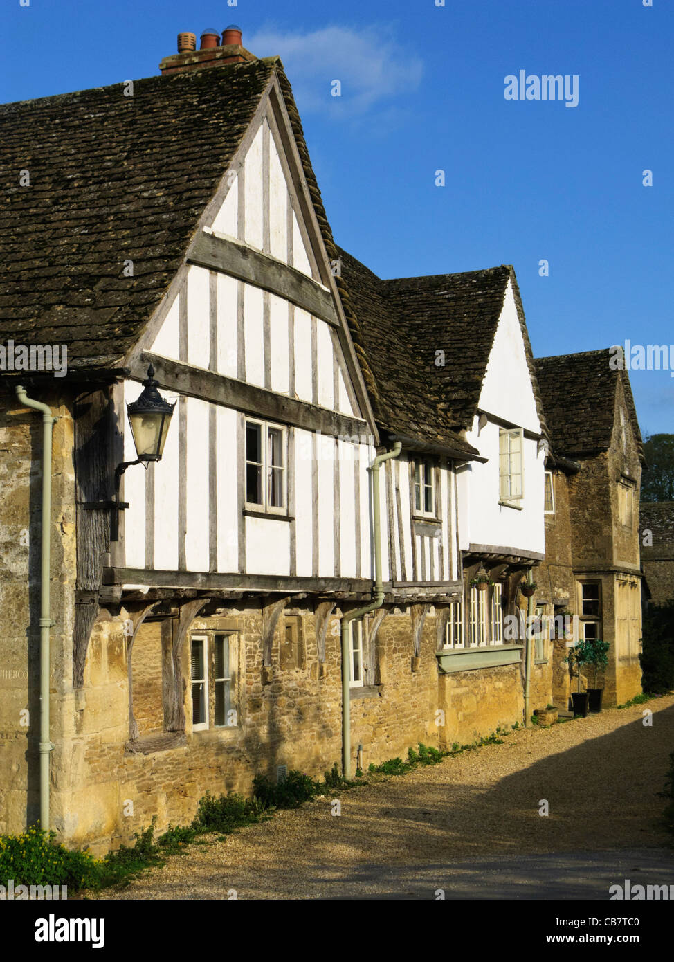 Medieval half timbered houses in Lacock Village, Wiltshire, England, UK Stock Photo