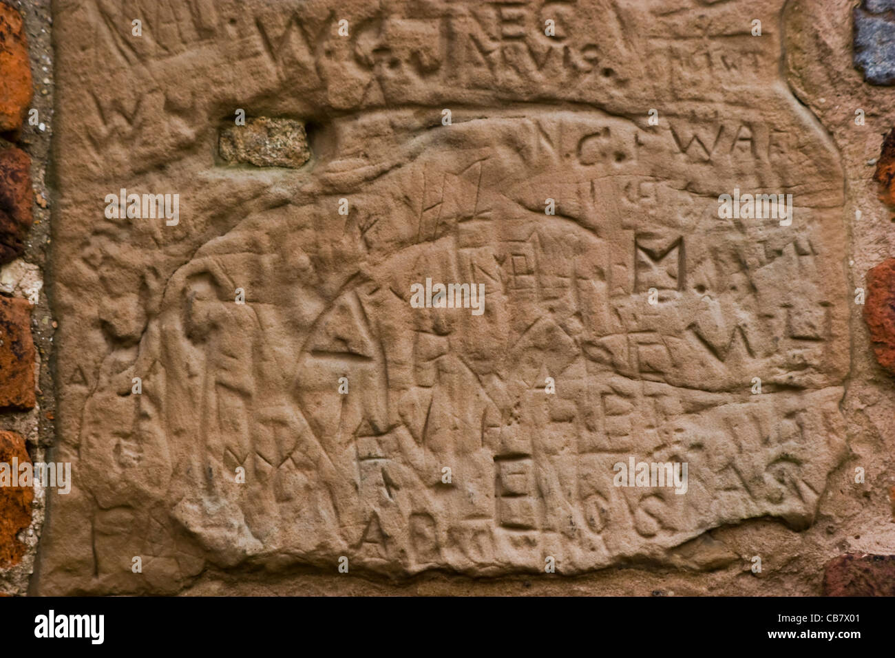 Carved Grafitti On Sandstone Blocks In The Walls Of The Ruins Of Bradgate House Stock Photo