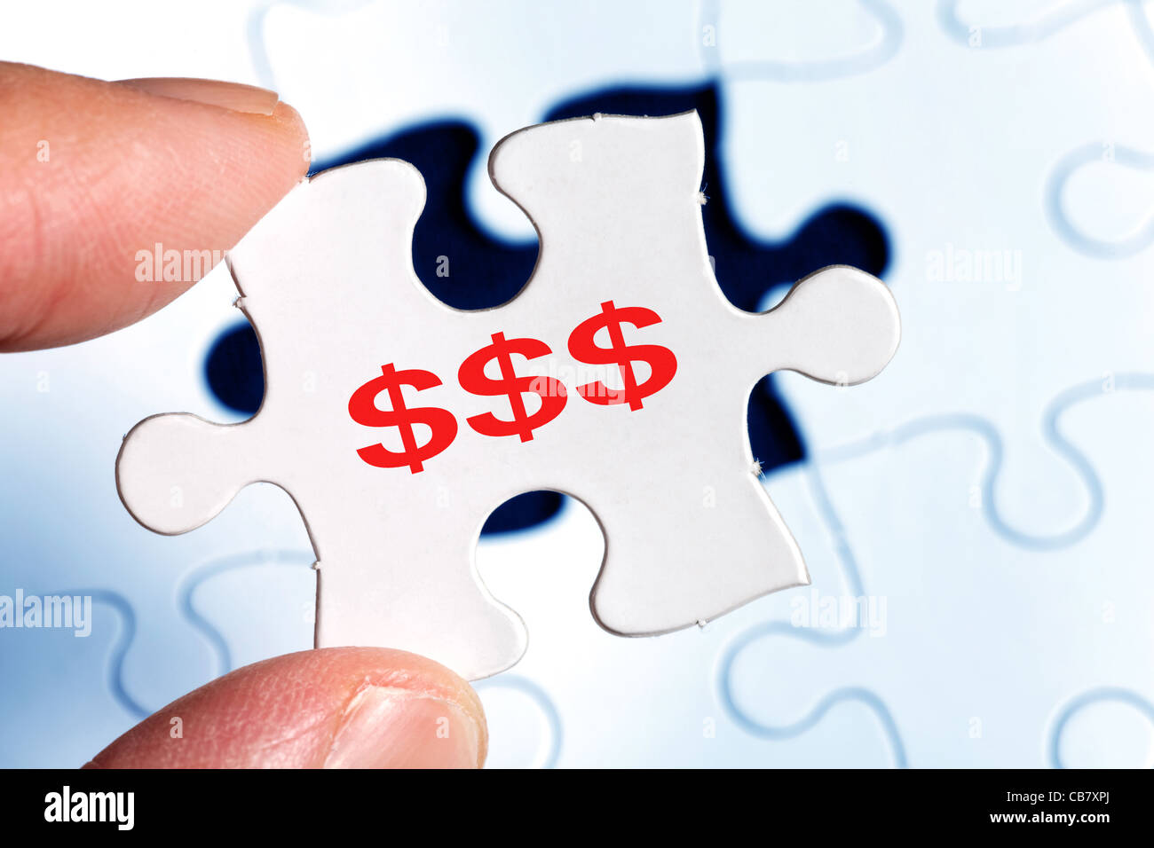 Puzzle and Dollar sign, business concept of Solution Stock Photo Alamy