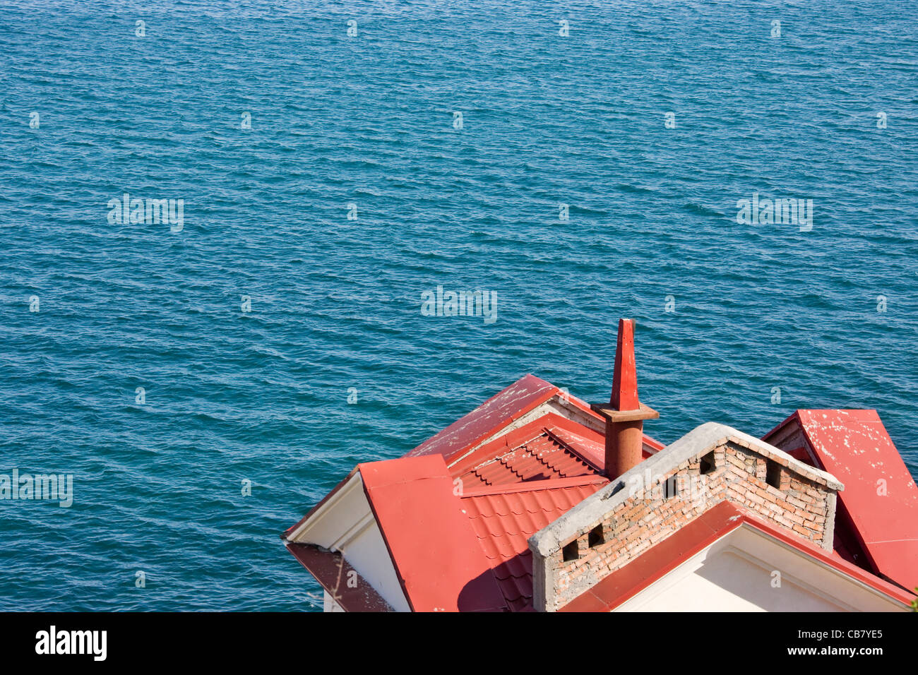 Red roofed house along the Black Sea coast, Crimea, Ukraine Stock Photo