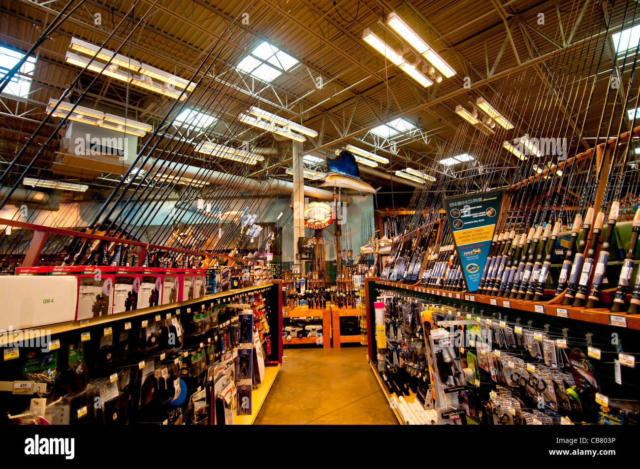 Bass Pro Shops Outdoor World interior with rows of fishing rods International Drive, Orlando Florida Stock Photo