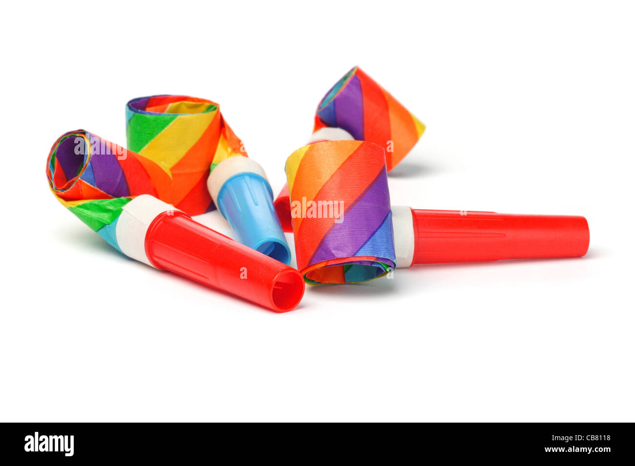 Close up of colorful party blowers on white background Stock Photo