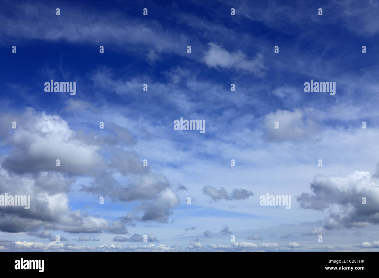 Beautiful blue fluffy cloudy sky in a summer day Stock Photo - Alamy
