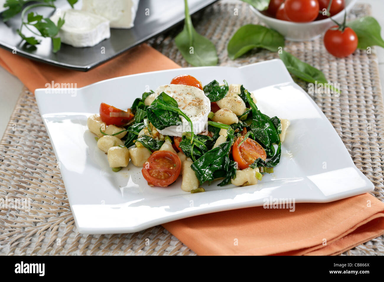 Sauteed gnocchi with goat cheese and spinach Stock Photo Alamy
