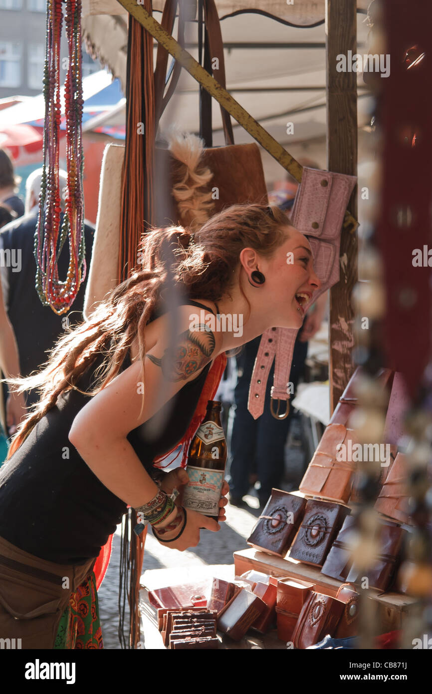 Smiling girl with dreadlocks at Türkenmarkt - Turkish market in Kreuzberg district Berlin, Germany. Stock Photo