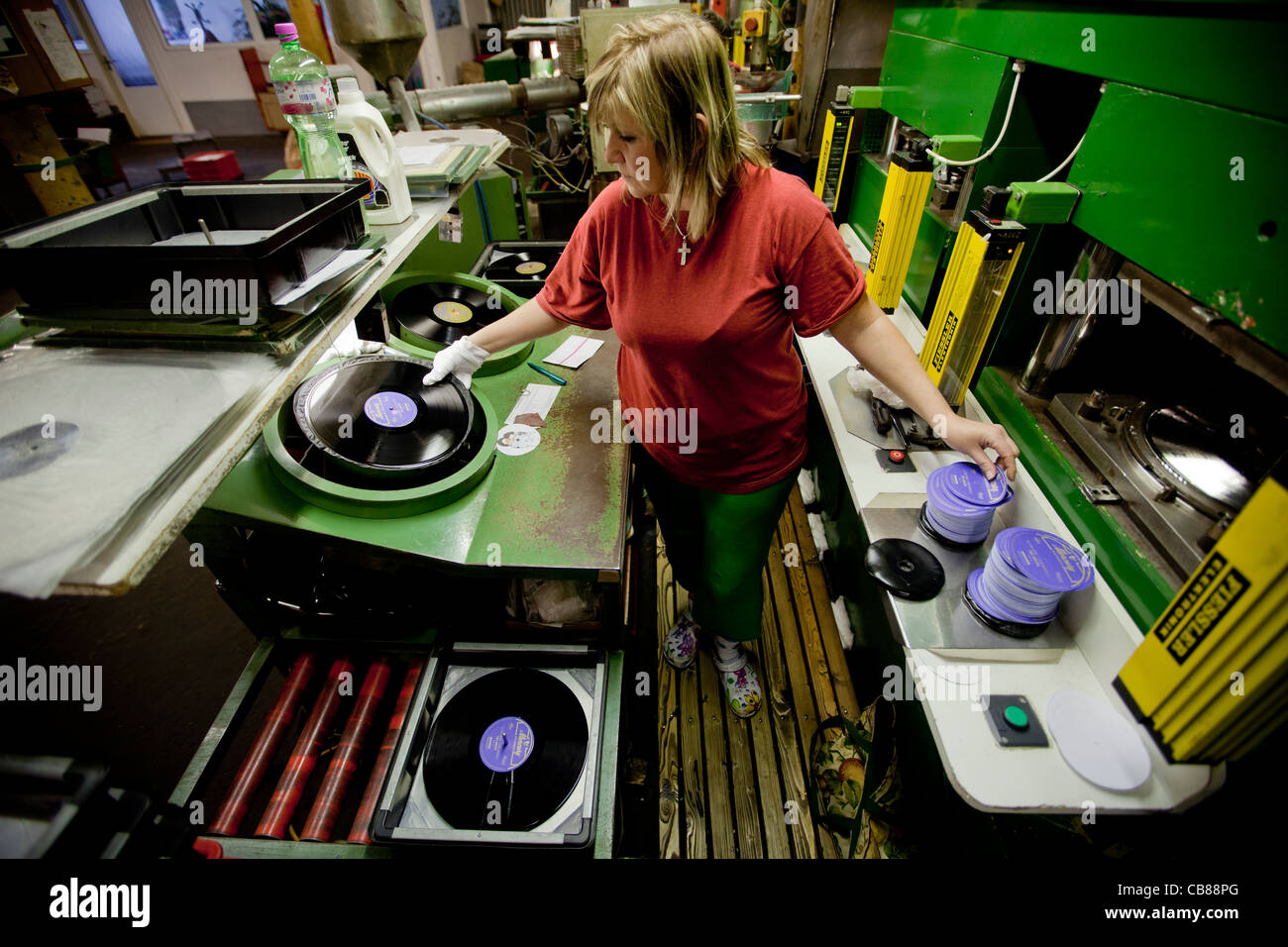 Production of vinyl records at  GZ Digital Media a.s. production facility in Lodenice, Czech Republic. The company produces Stock Photo