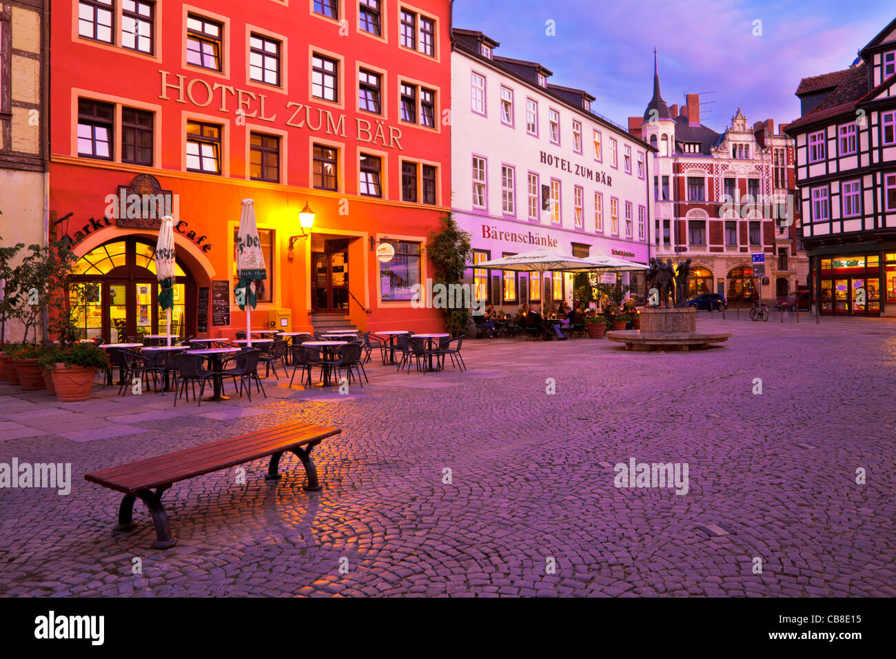 Twilight in the main market place or square, the Markt, in the UNESCO World Heritage site of Quedlinburg, Germany Stock Photo