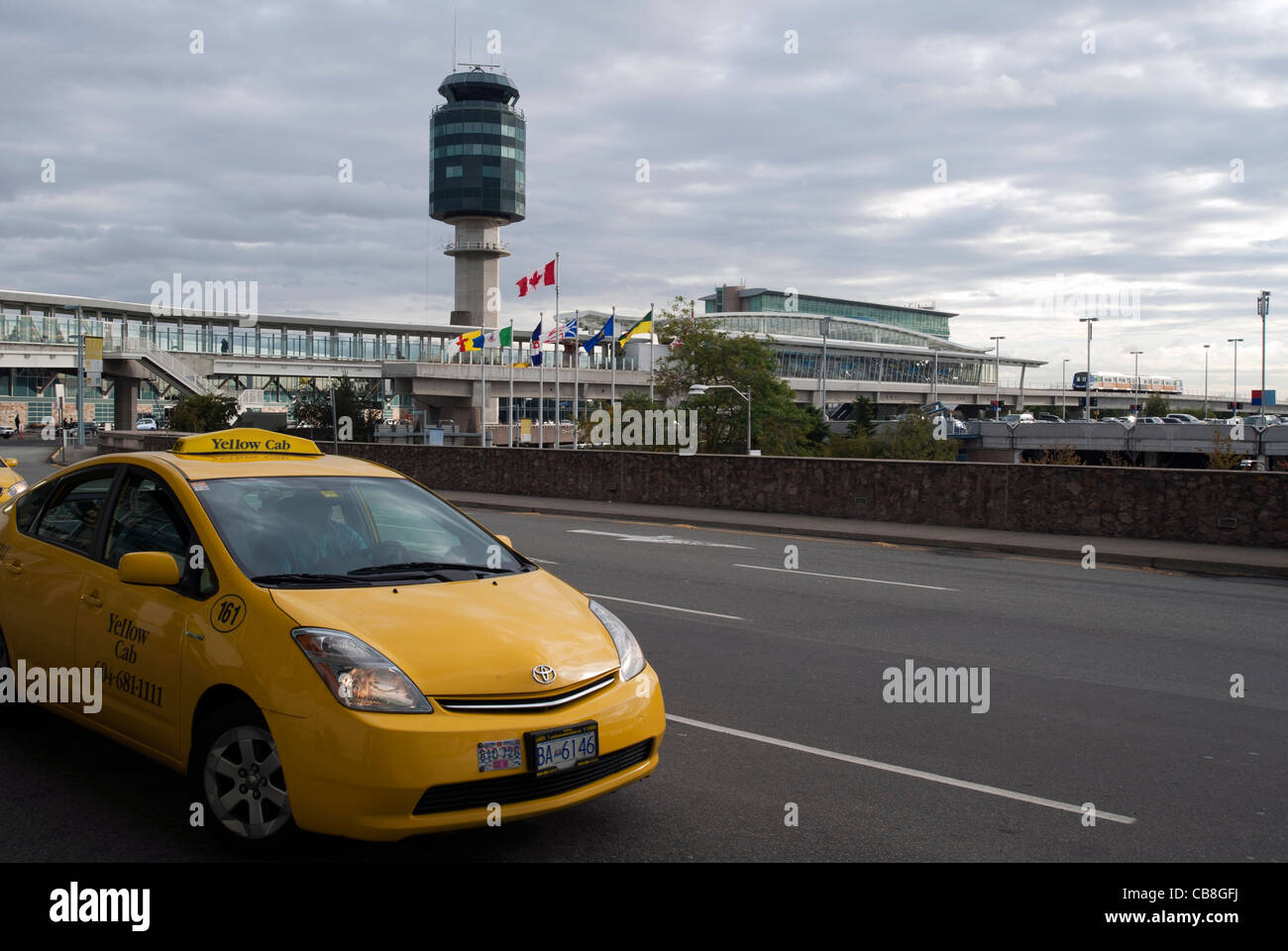 Yellow taxi cab outside Vancouver International Airport, British Columbia, Canada Stock Photo