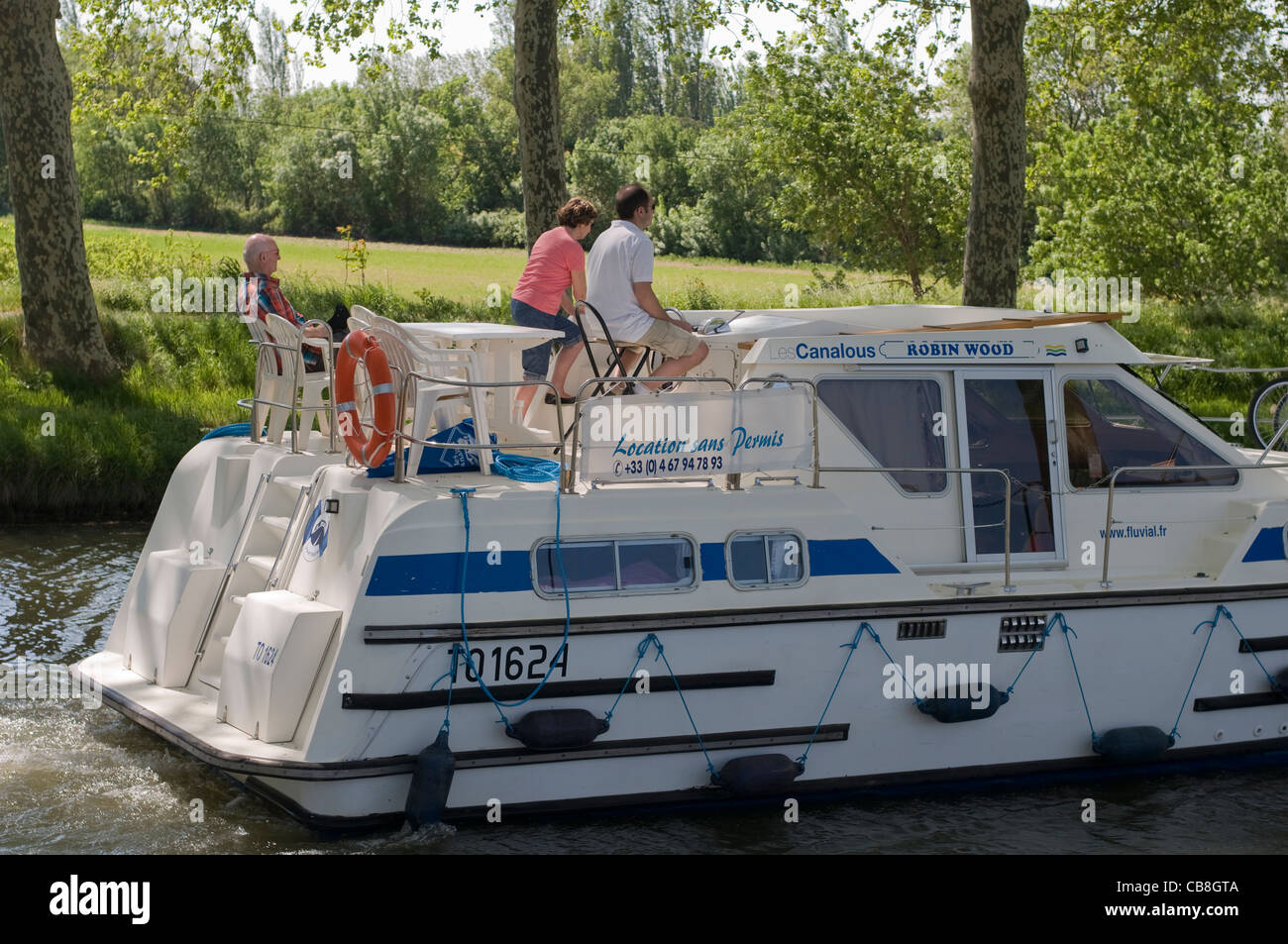 Hire boat on the Canal du Midi near Beziers Languedoc-Roussillon France Stock Photo