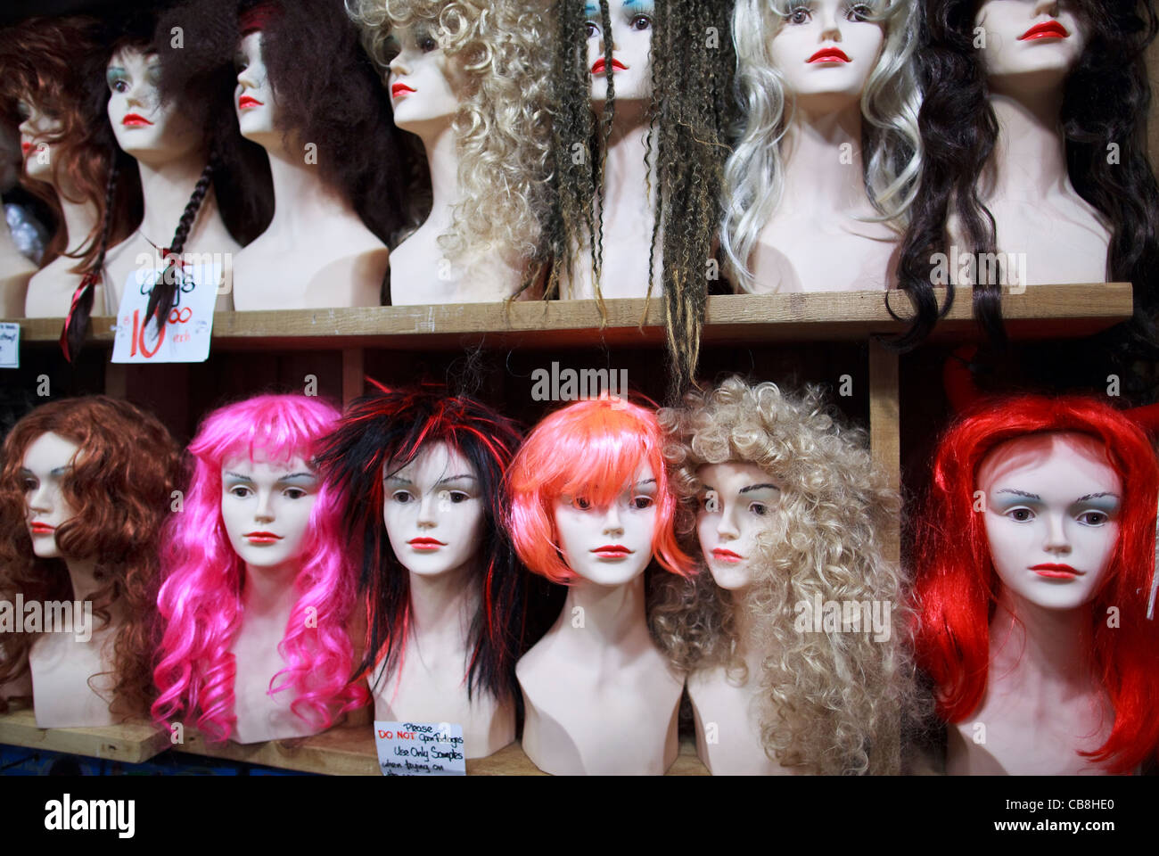 Female wigs on mannequin heads Stock Photo - Alamy