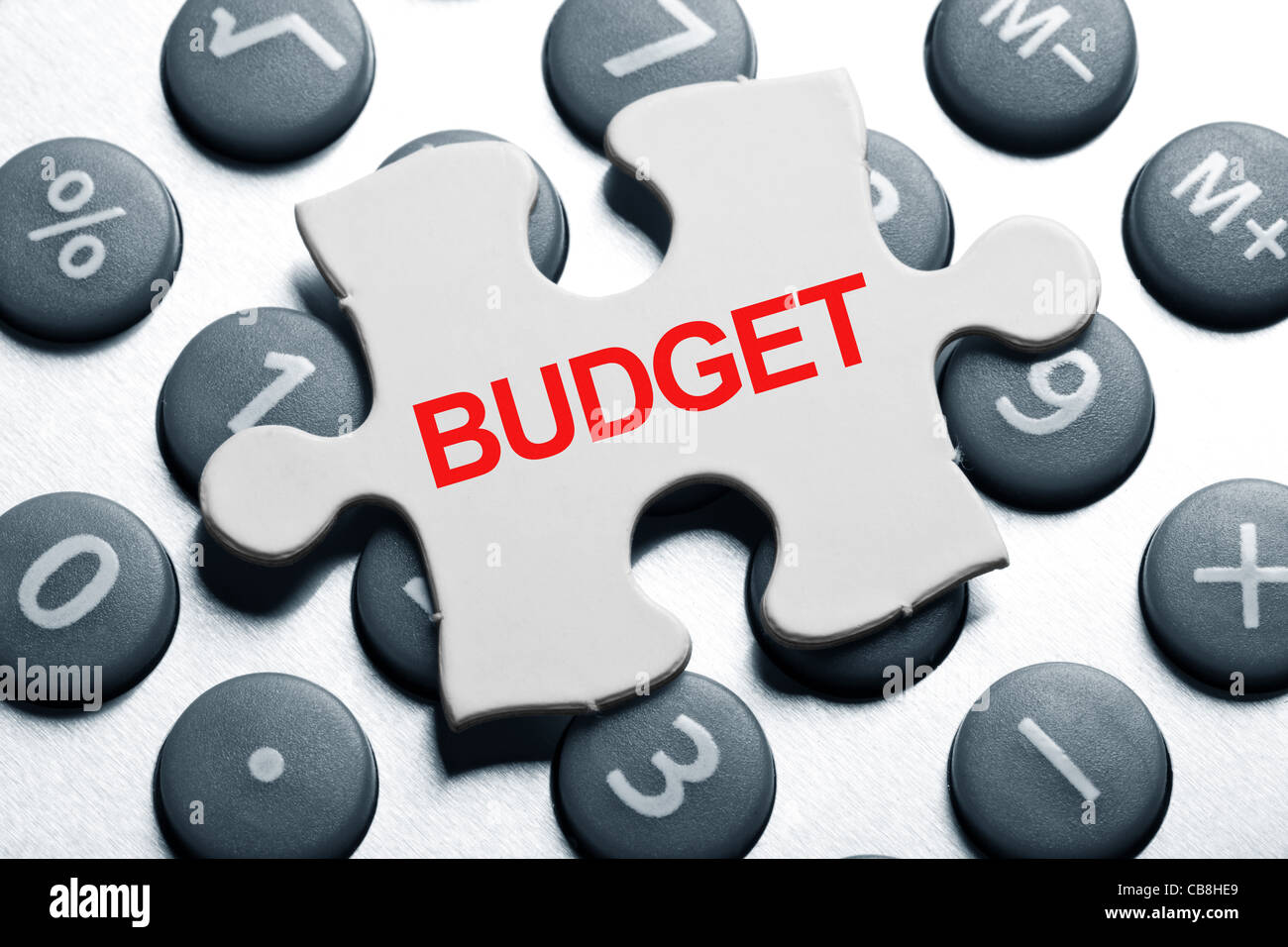 calculator and Puzzle, business concept of Budget Stock Photo