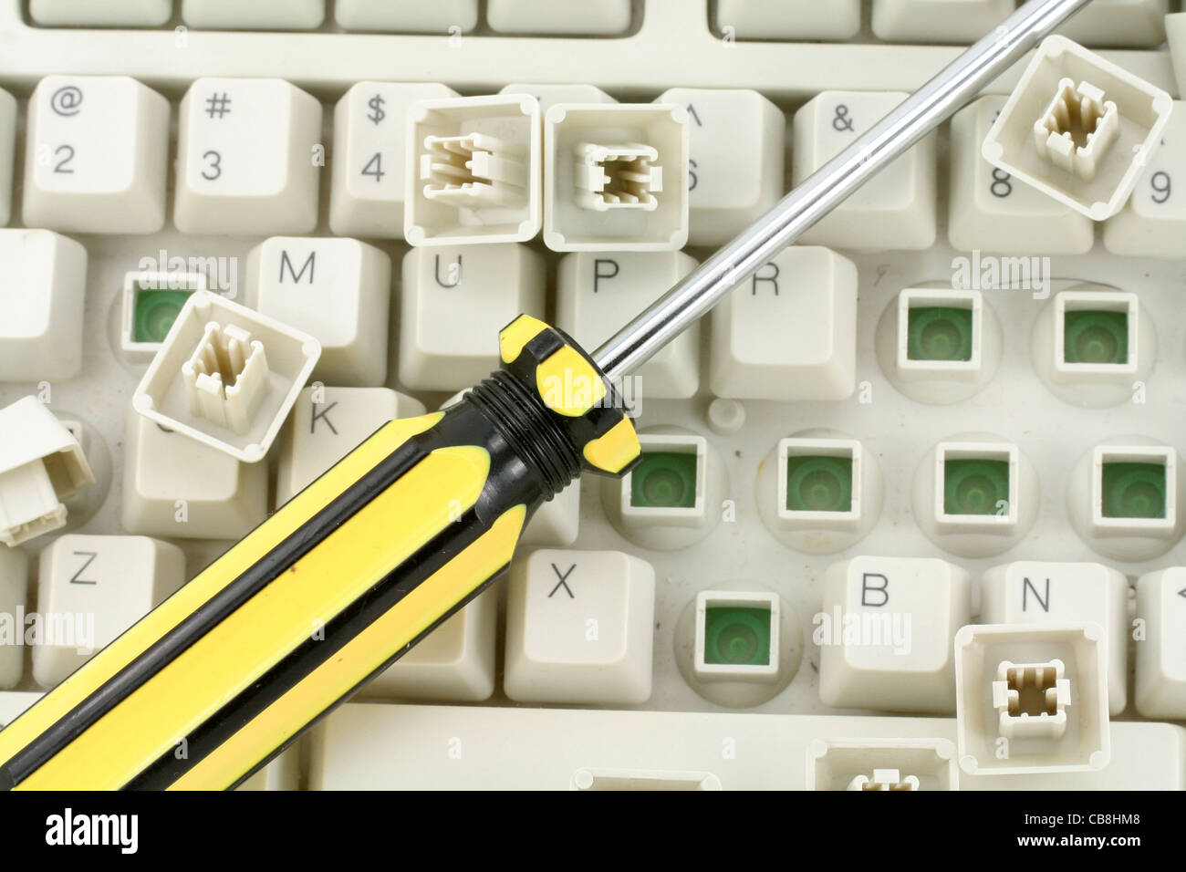 screw driver and keyboard, concept of computer repairing Stock Photo Alamy