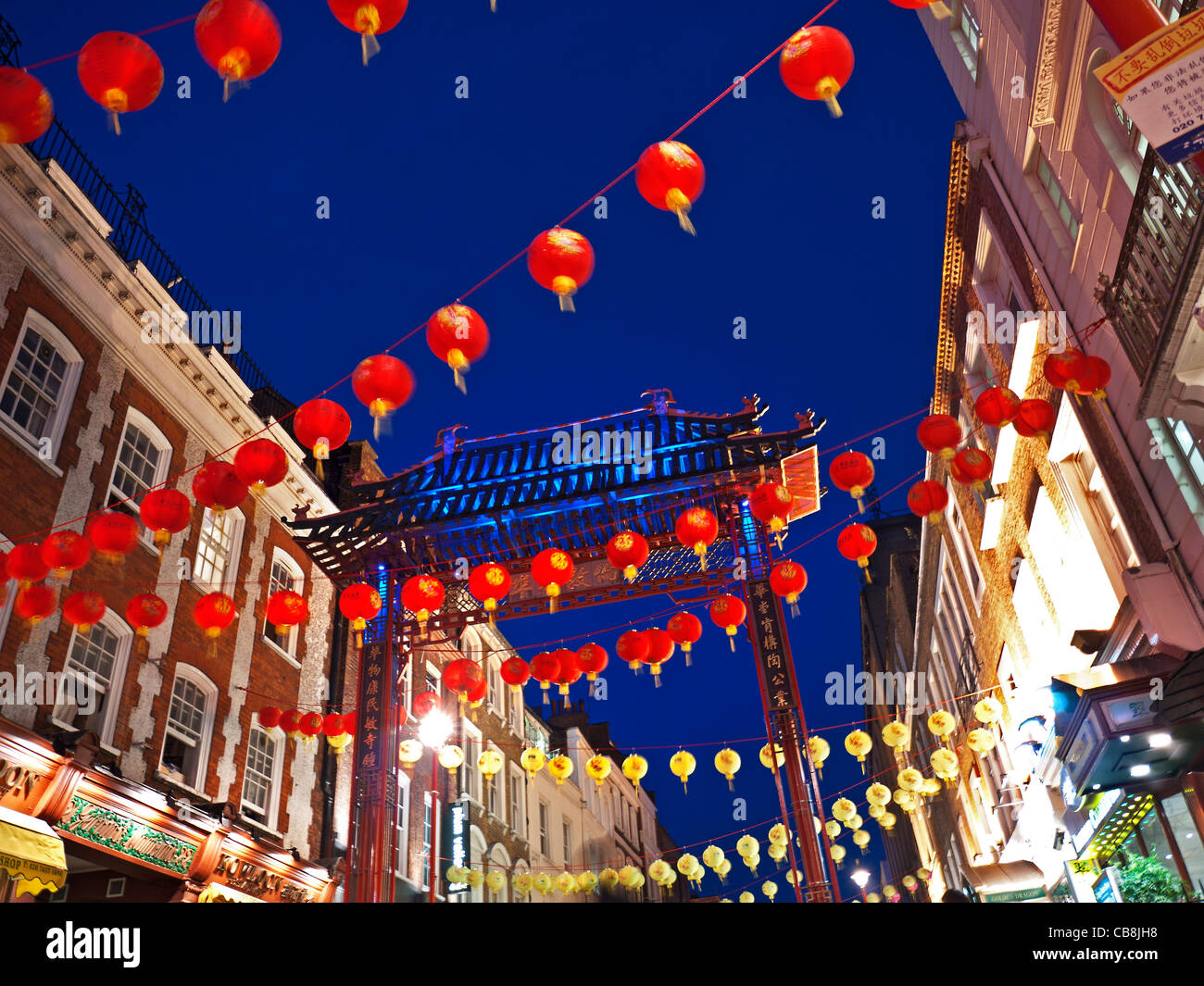Chinese lanterns lit up on a busy celebration night in Chinatown Soho