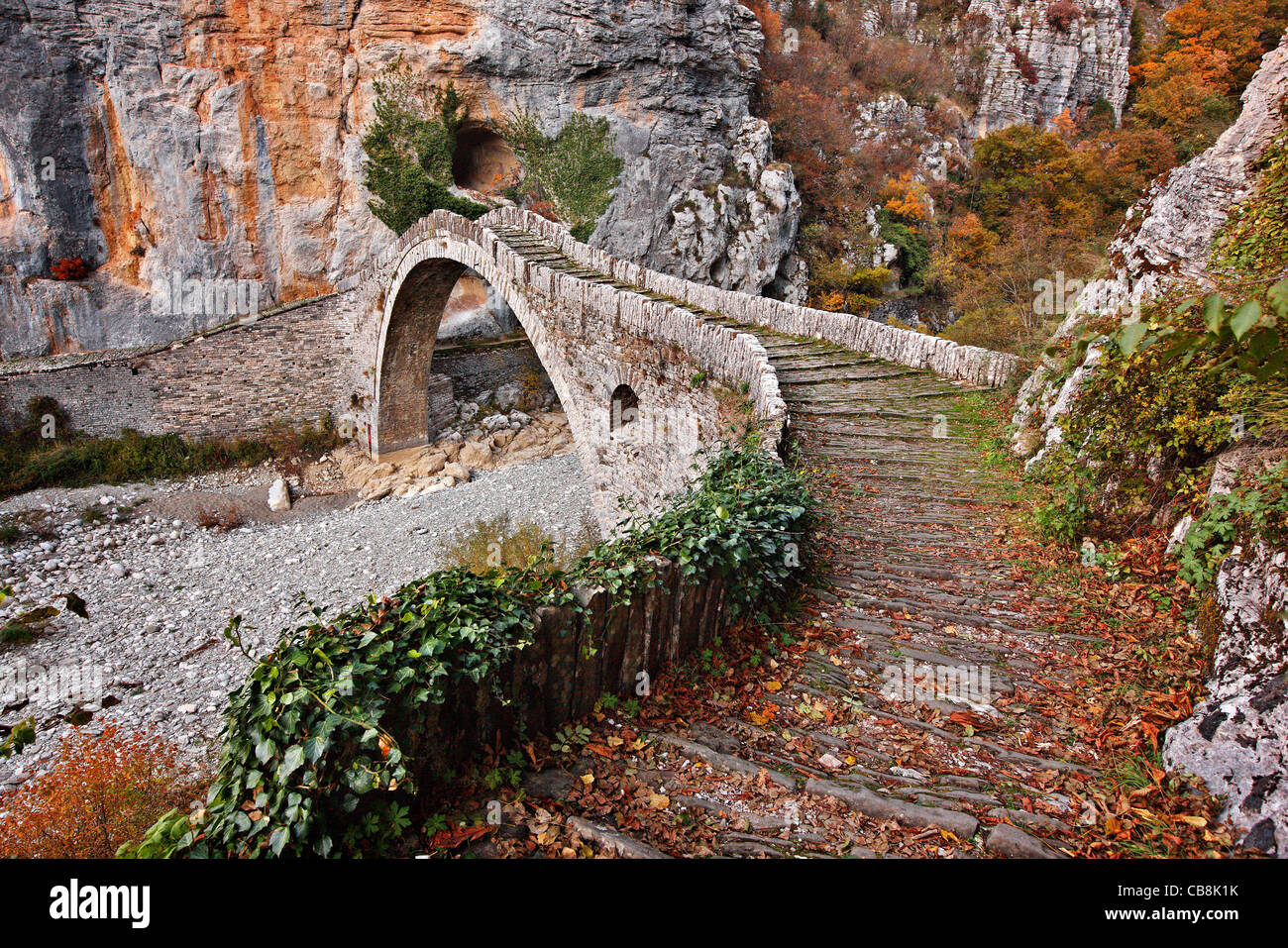 The beautiful stone bridge known as 'Kokkoris' or 'Noutsios' bridge, Zagori region, Ioannina,  Epirus, Greece. Stock Photo
