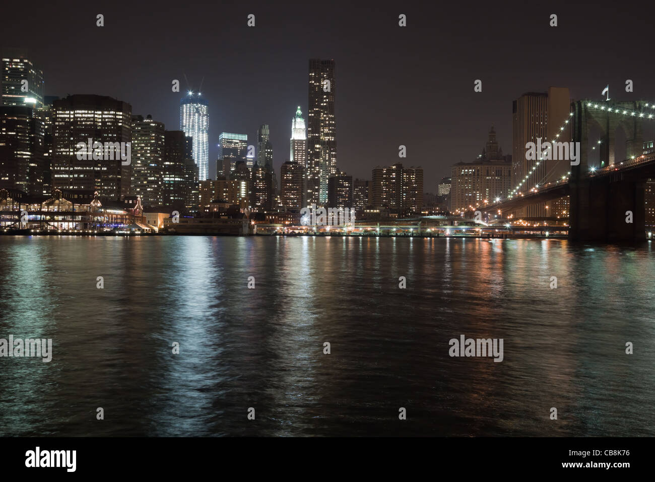 The New York City skyline at twilight w the Freedom tower Stock Photo ...