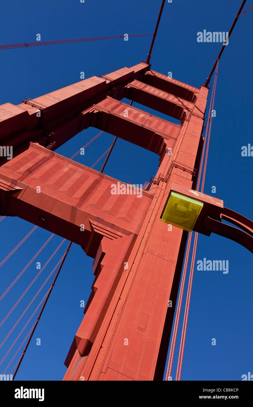Golden Gate Bridge Tower against blue sky Stock Photo