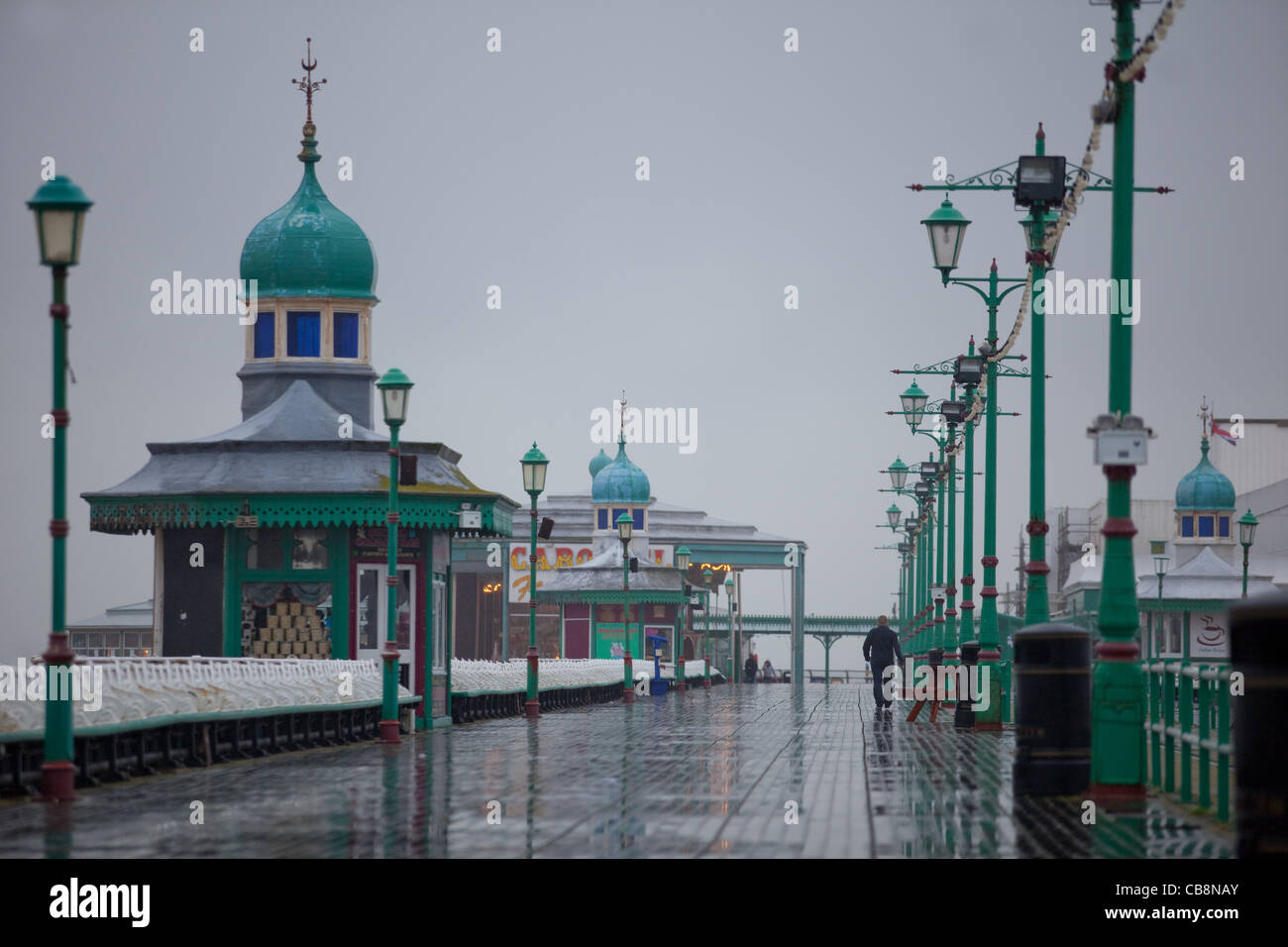 Blackpool Pier in the rain on a cold and wet summers day Stock Photo ...