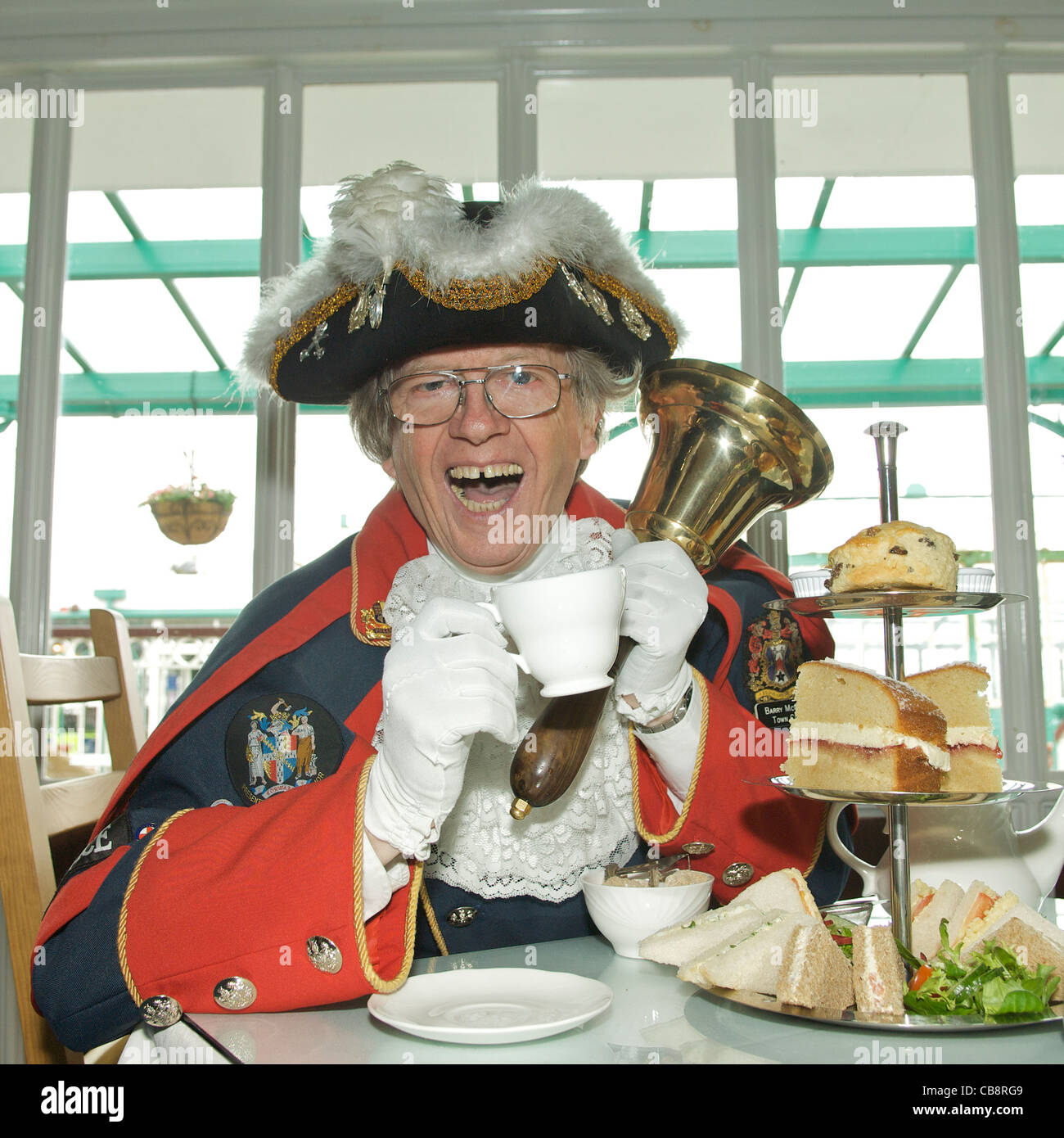 Town Crier enjoys a cup of tea in the Victorian tea rooms on North Pier