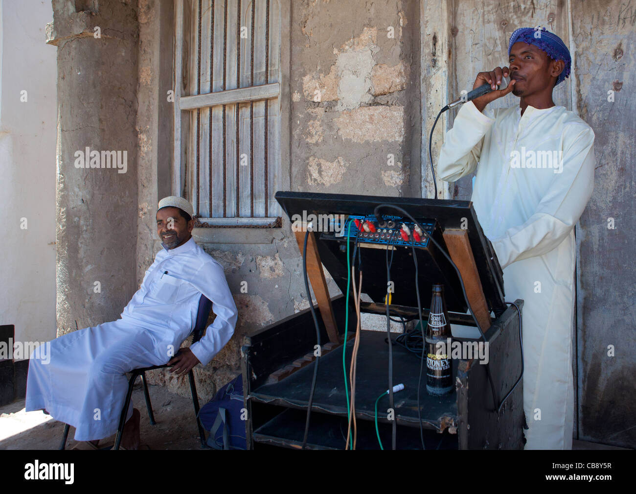 Muslim Man Speaking In A Microphone, Lamu, Kenya Stock Photo