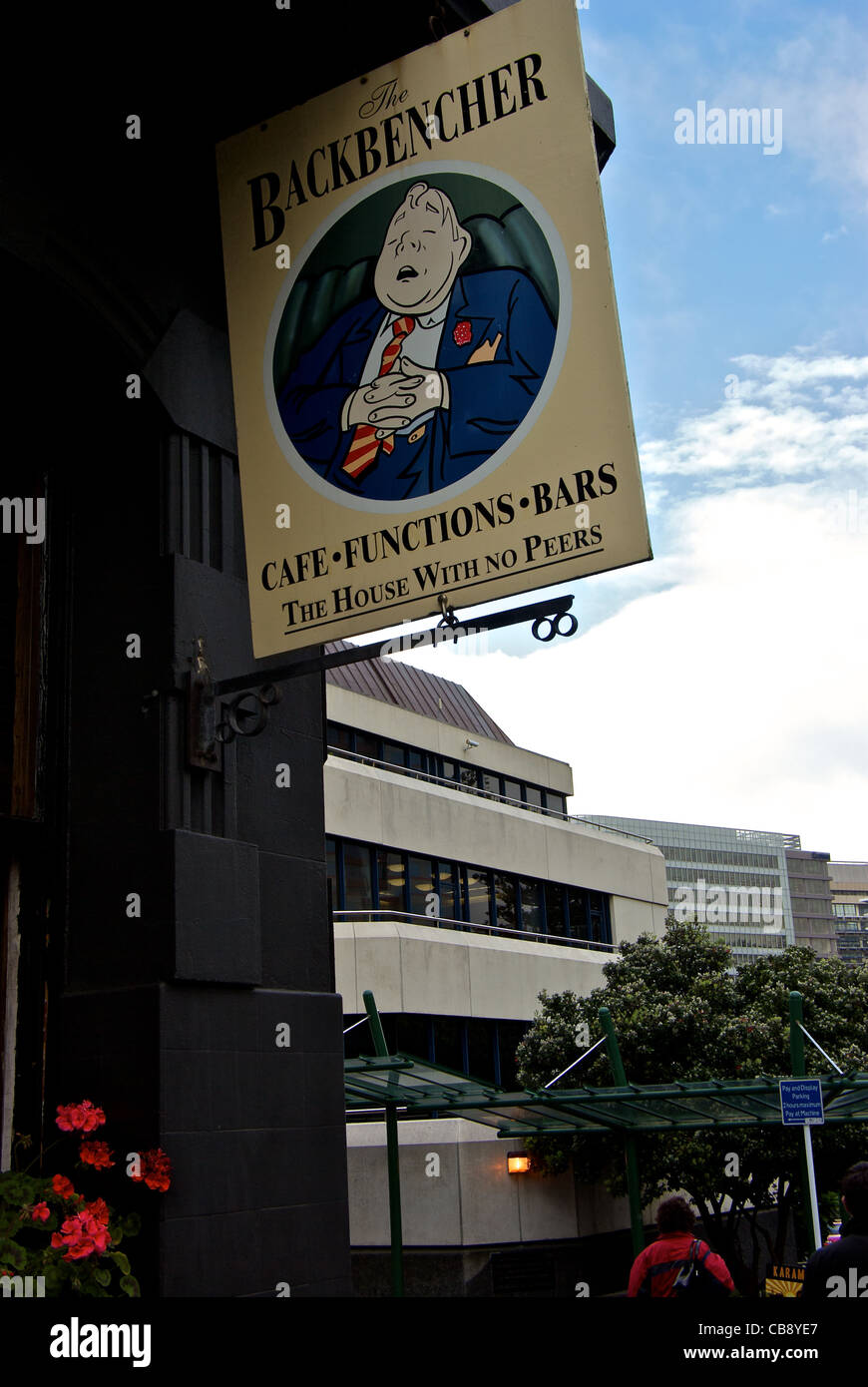 Sign Backbencher cafe bar across street New Zealand Parliament buildings Wellington Stock Photo
