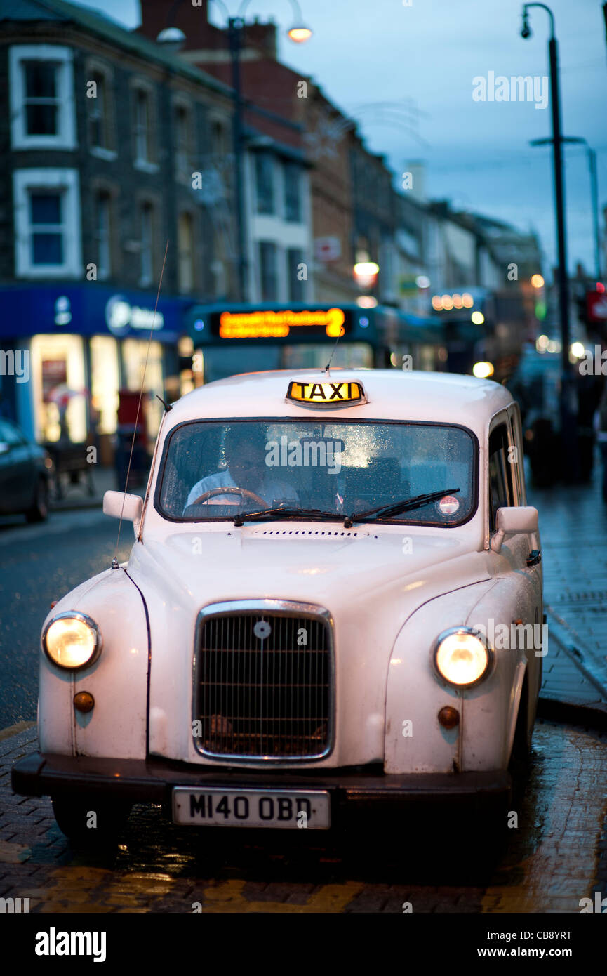 a white London taxi cab, UK Stock Photo Alamy