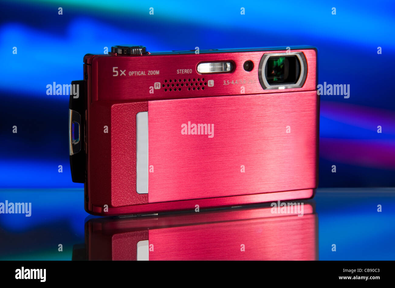 photo of the compact digital camera with beautiful background and glass reflection Stock Photo