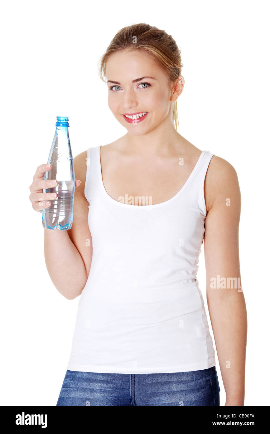 Teen woman drinking mineral water from bottle Stock Photo Alamy