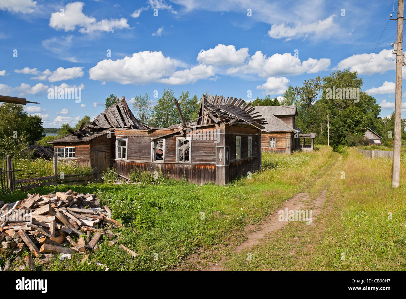 Old wooden houses in russian village Stock Photo - Alamy