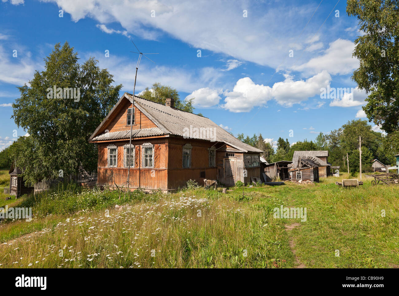 Old wooden house in russian village Stock Photo - Alamy