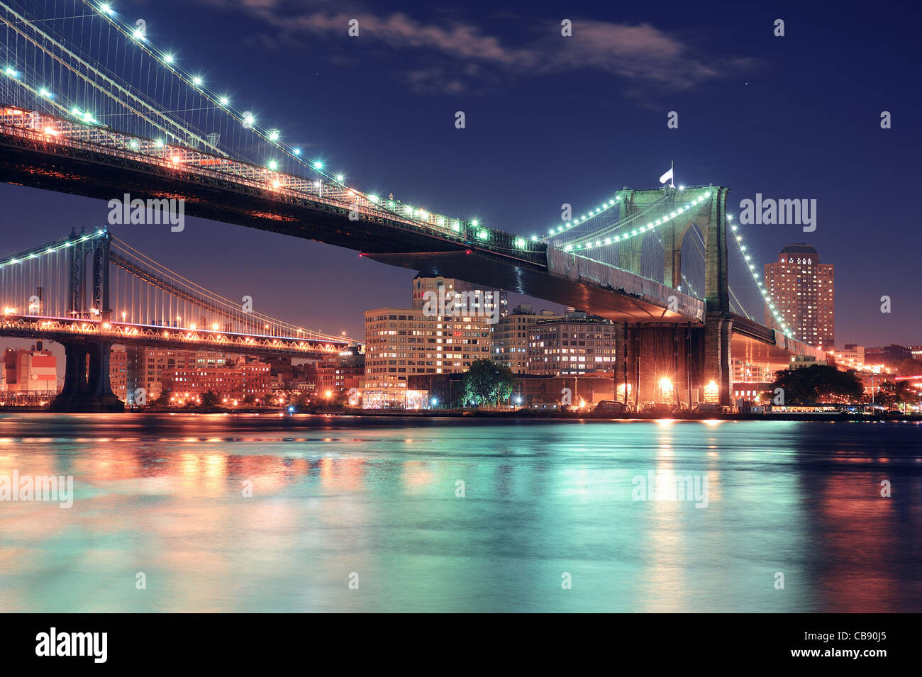 Brooklyn Bridge over East River at night in New York City Manhattan ...