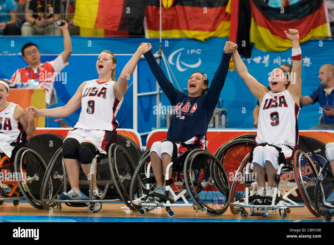 USA female wheelchair basketball players celebrate their victory over