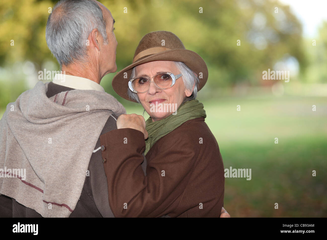 senior couple walking in the park Stock Photo - Alamy