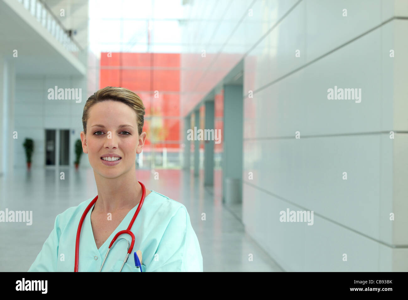 portrait of female nurse in hospital corridor Stock Photo - Alamy