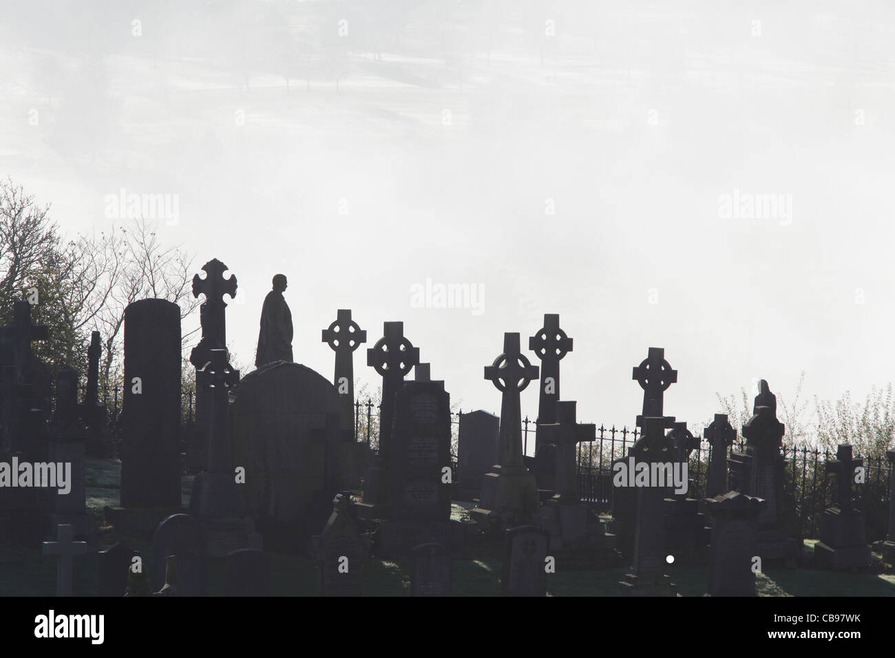 Stirling Old Town Cemetery with fog in the background, Scotland, UK Stock Photo