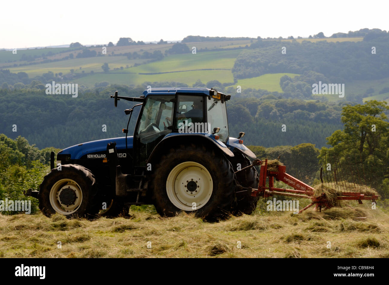 Raking up hay hi-res stock photography and images - Alamy
