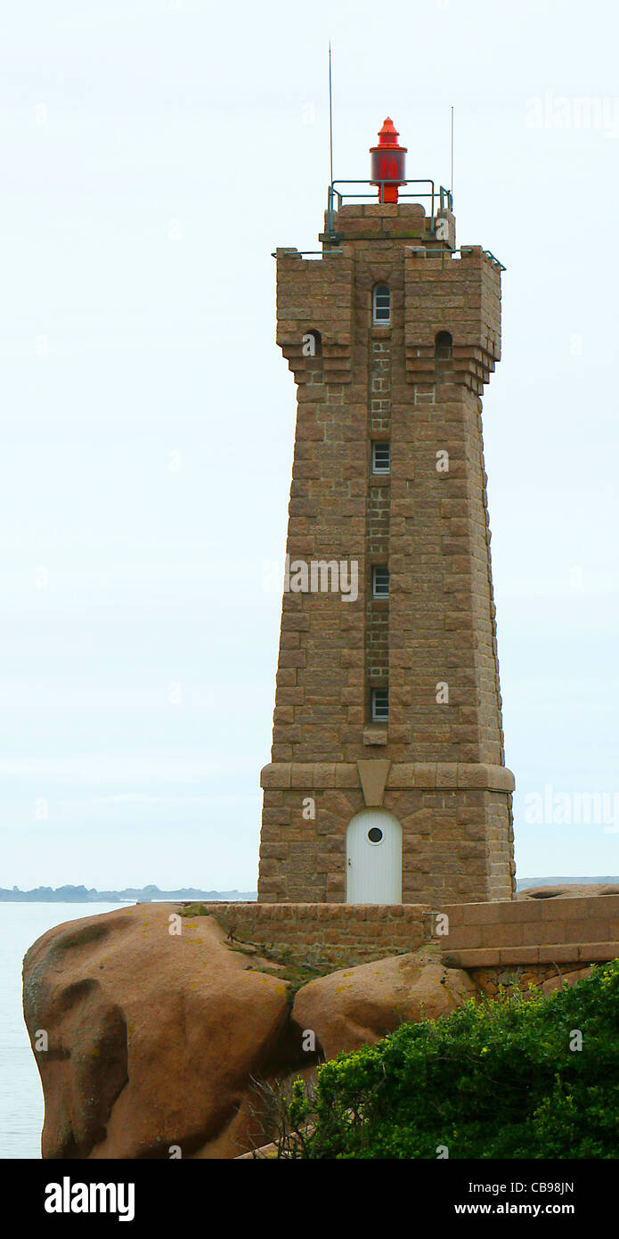 Perros Guirec coast pink granite over ploumanac'h, ploumanac'h lighthouse Stock Photo