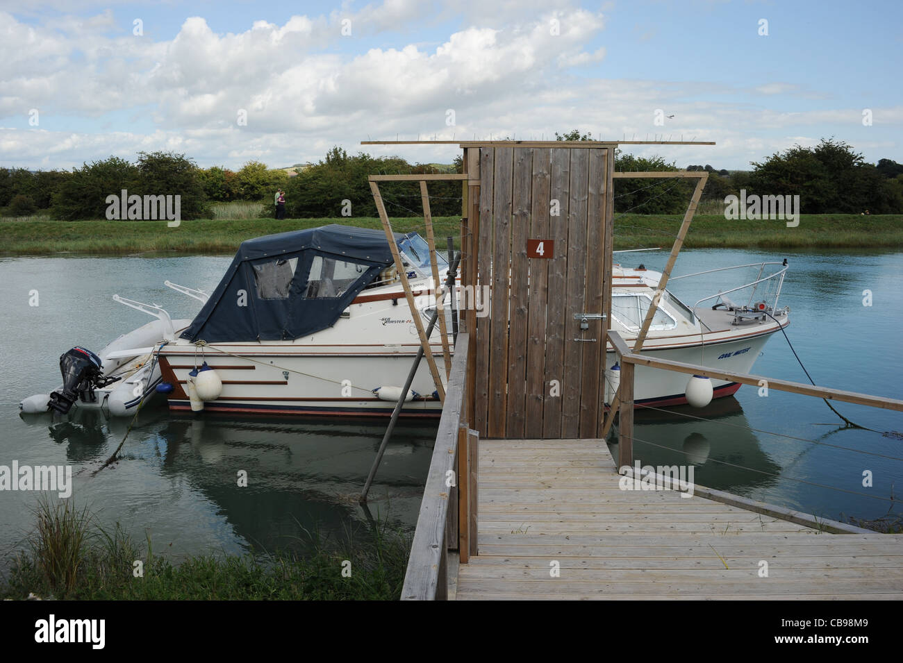 Boat Moored on the River Arun, Arundel, West Sussex, UK Stock Photo