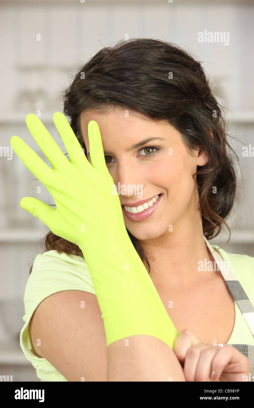 Woman wearing pair rubber gloves hi res stock photography and images Alamy