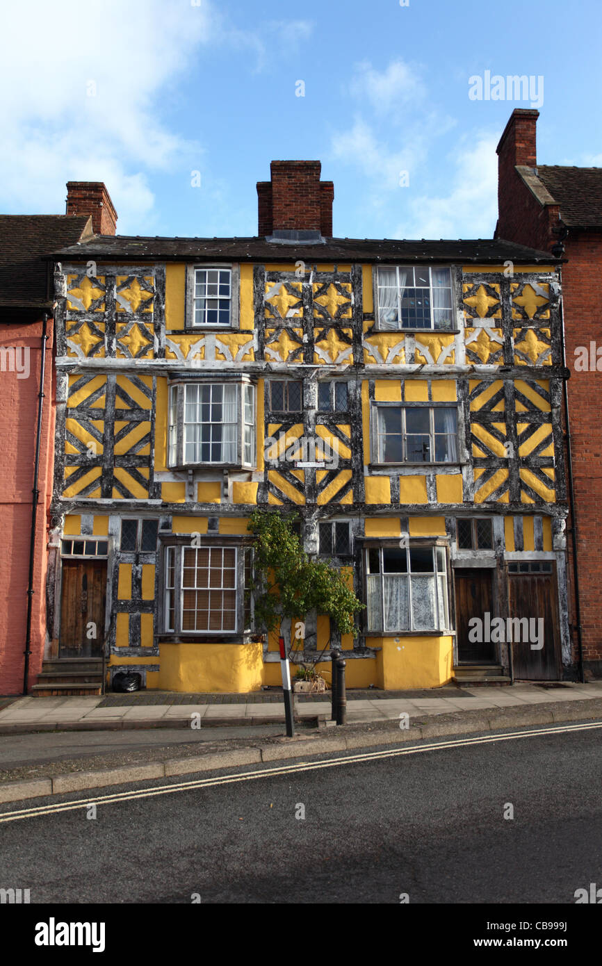 Tudor building showing the timber frame and yellow plasterwork, Ludlow, Shropshire UK Stock Photo