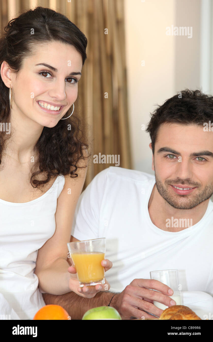 Breaking in bed on tray Stock Photo