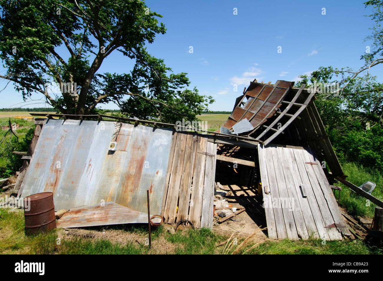 Shed that collapsed from wind damage on a farm in Walnut Ridge, Arkansas, USA. Stock Photo